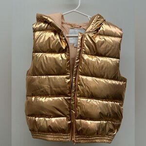 Girls metallic puffer vest with hood.